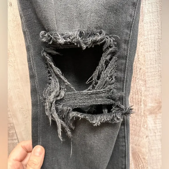 L’ Agence high rise distressed style black jeans