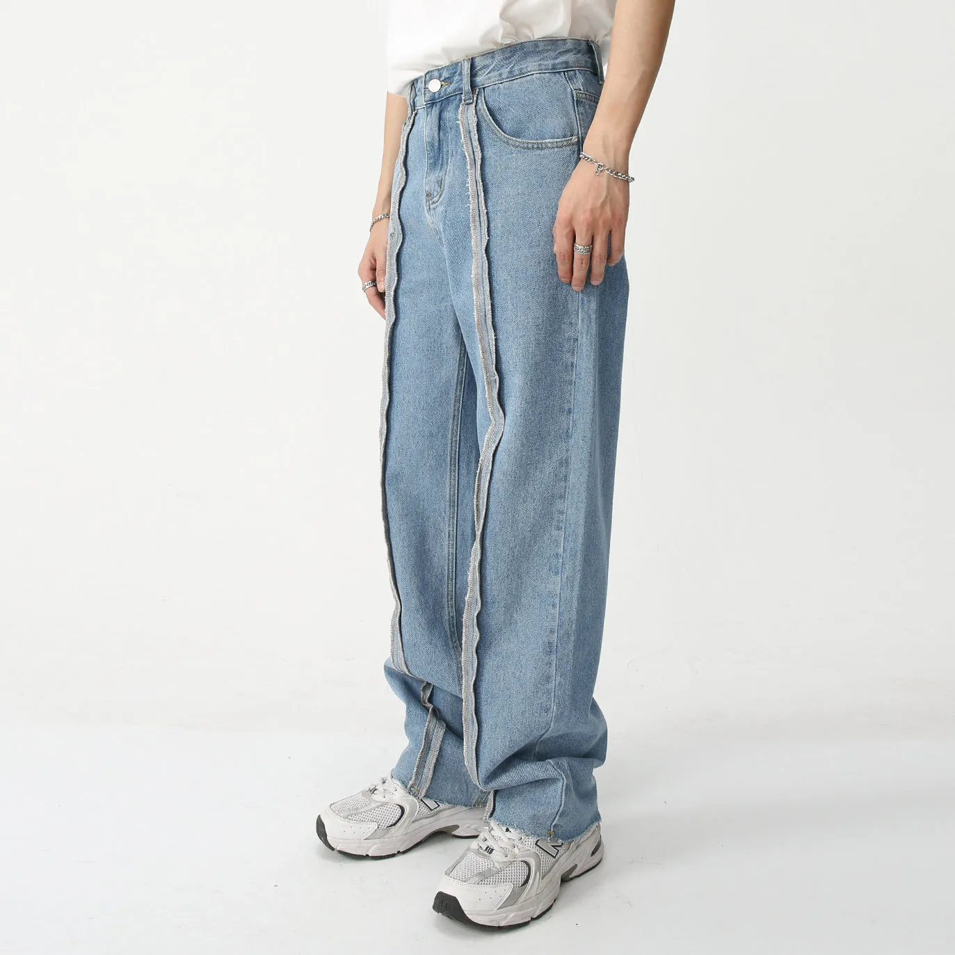 Paneled frayed washed straight-leg loose-fit wide-leg jeans