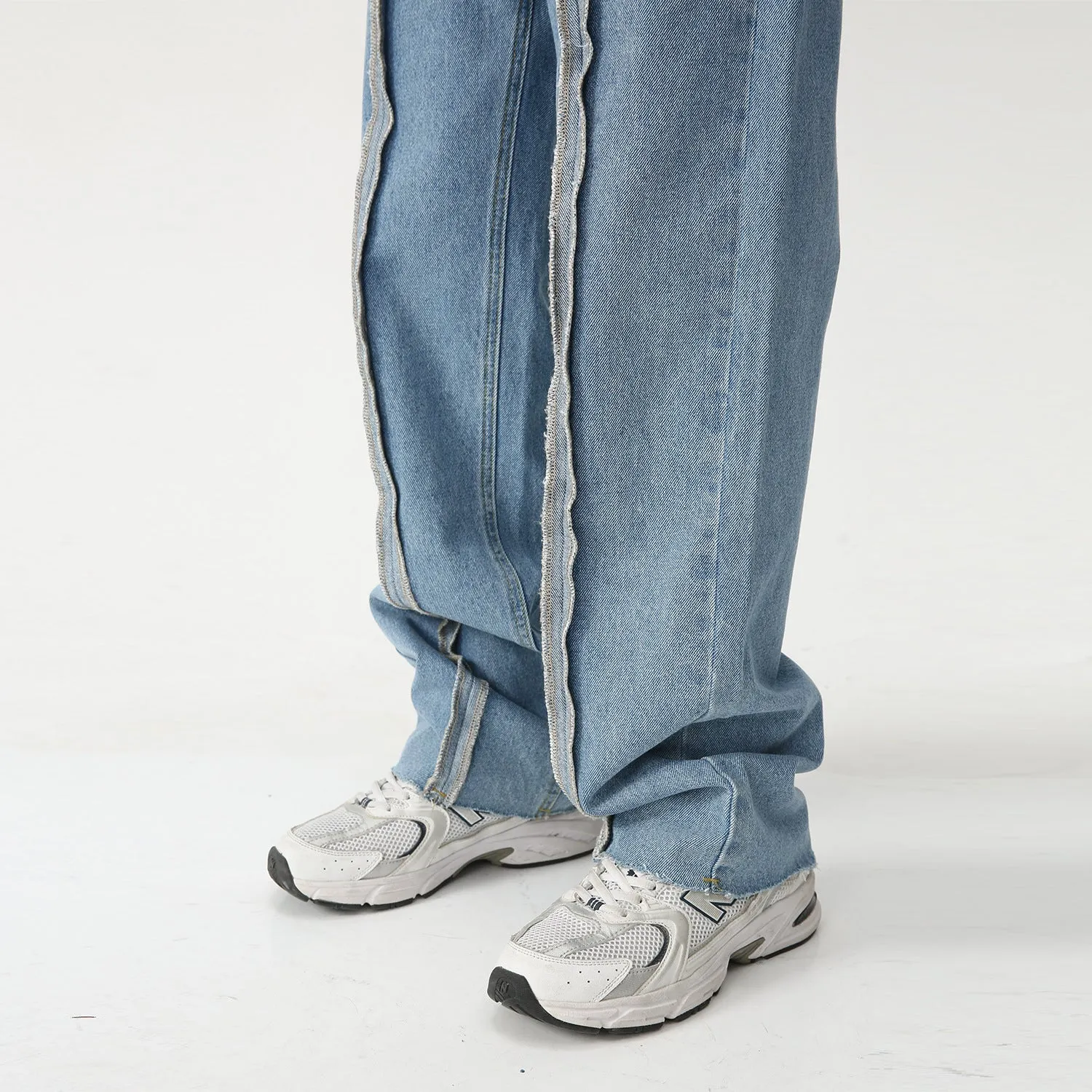 Paneled frayed washed straight-leg loose-fit wide-leg jeans