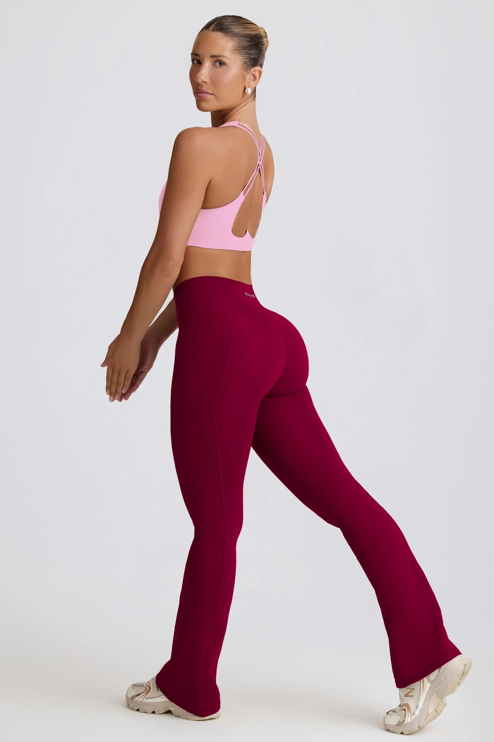 Soft Active Crossover Flared Trousers in Burgundy
