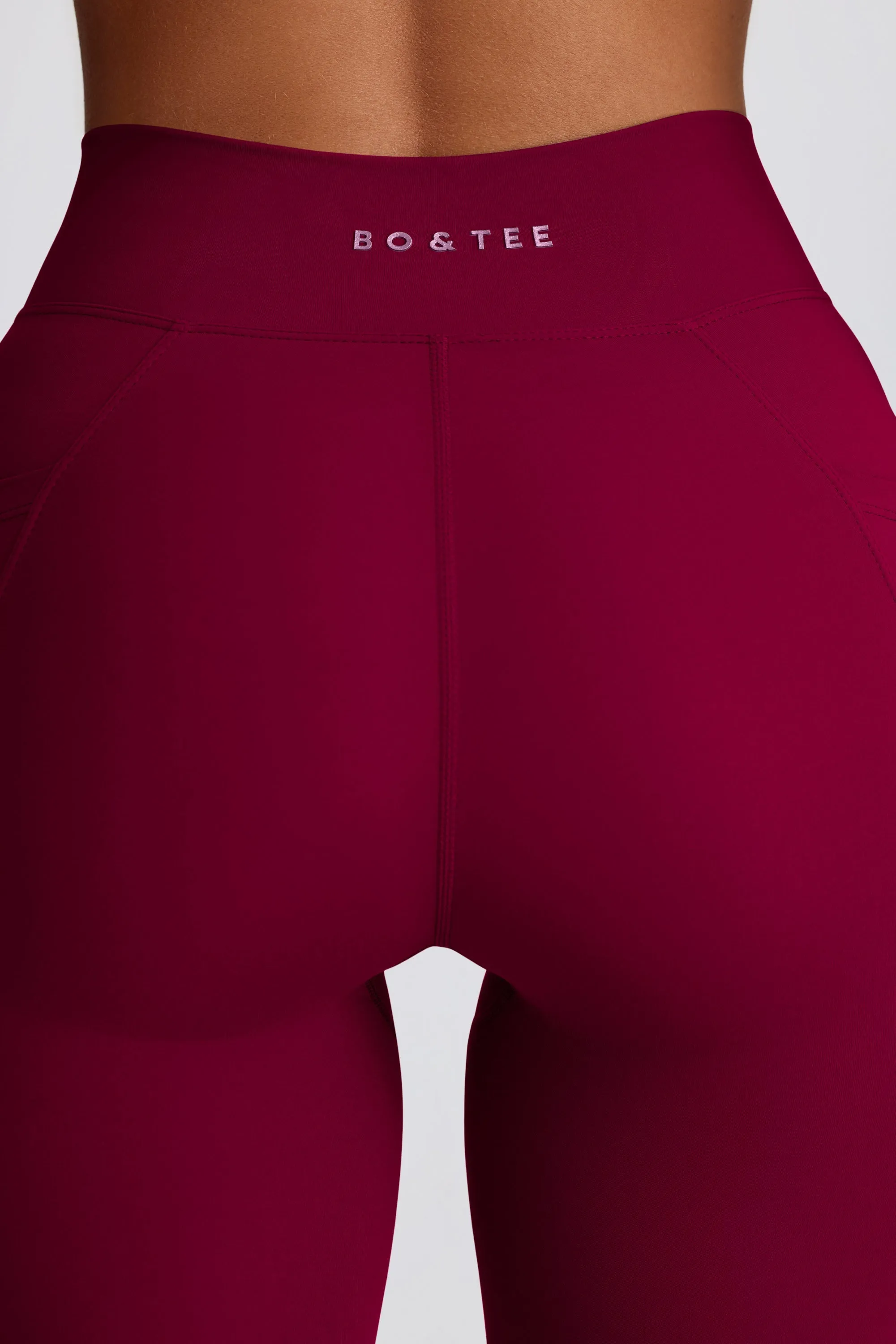 Soft Active Crossover Flared Trousers in Burgundy