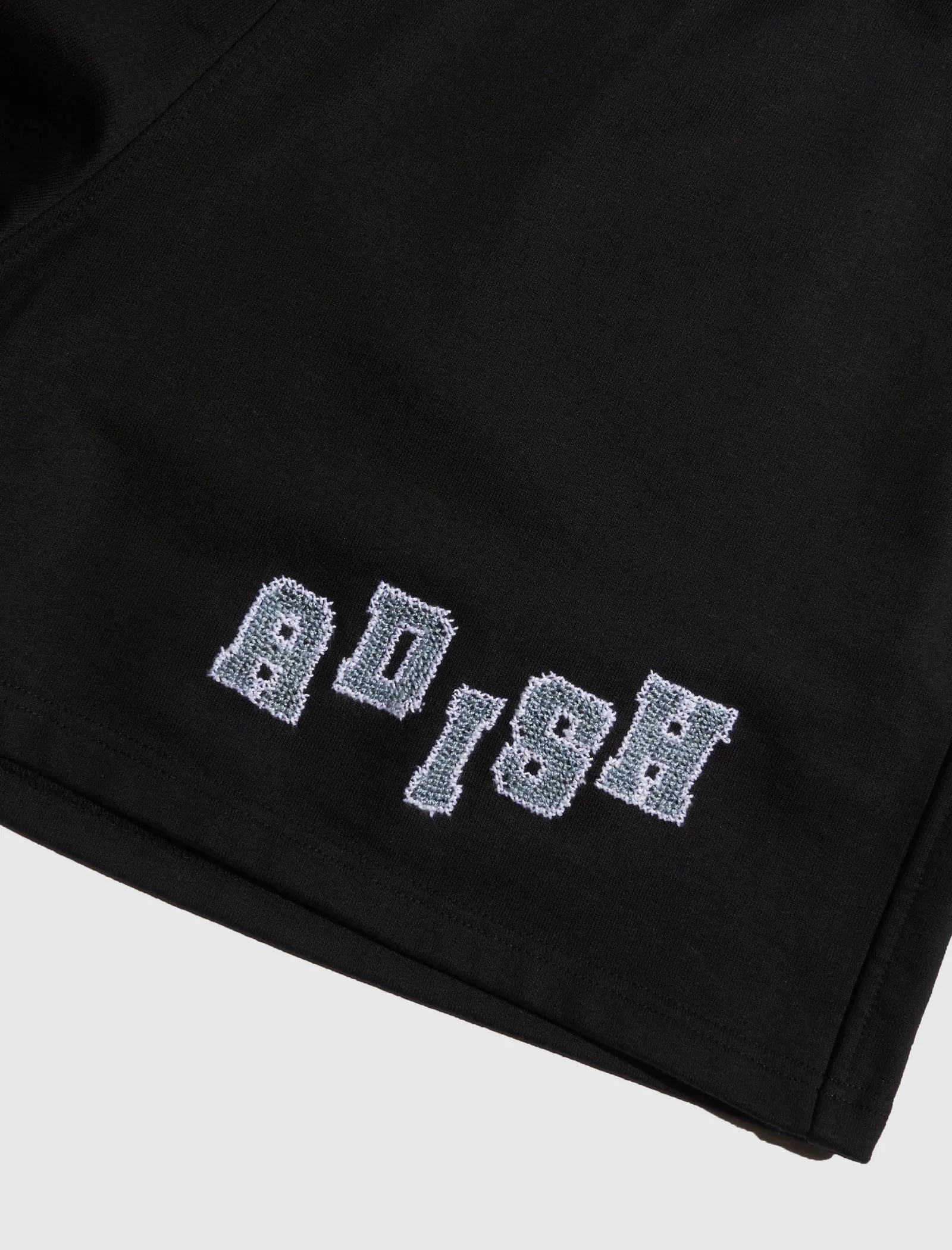 TATREEZ LOGO SHORTS